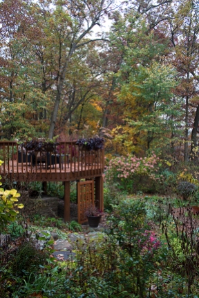 The deck, garden, and woods